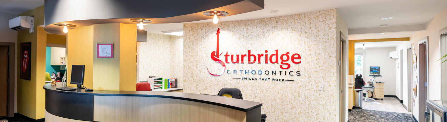 Behind the reception desk at Sturbridge Orthodontics